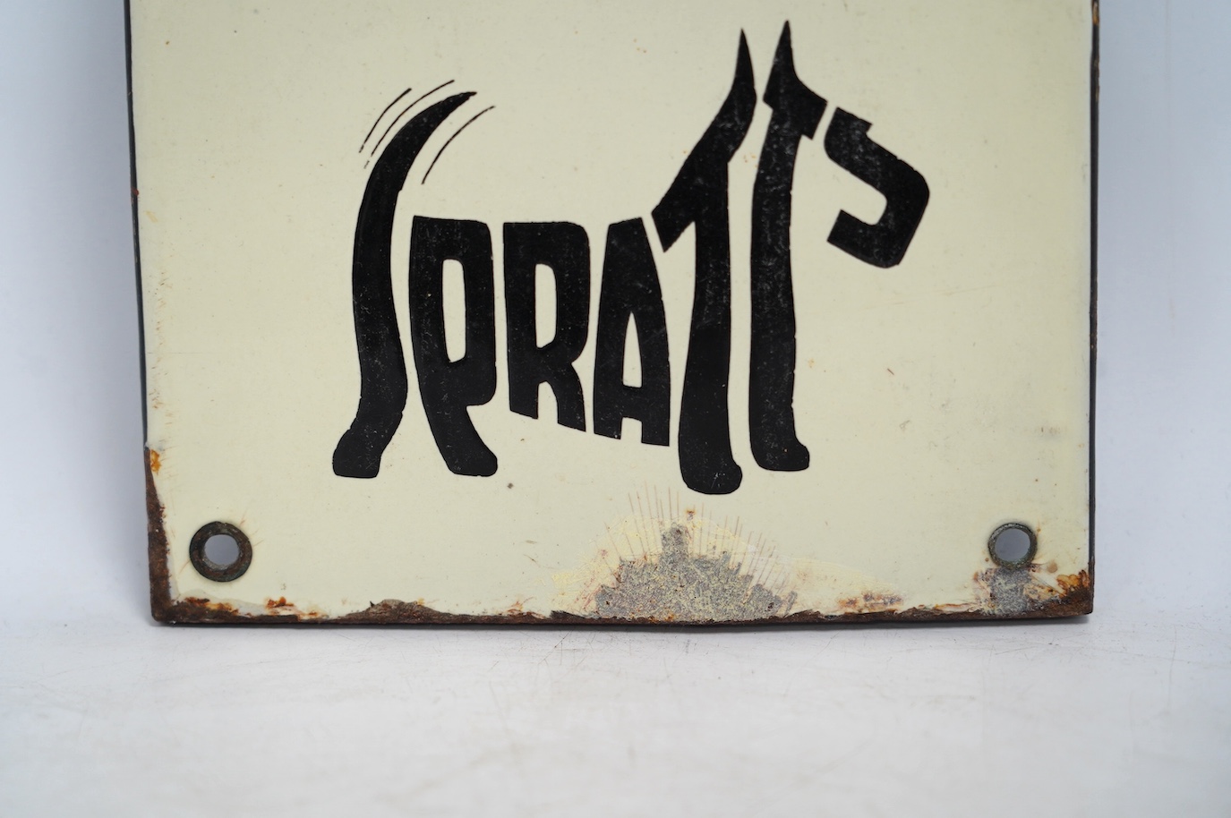A vintage Spratt’s 'Five Terrier' enamel advertising sign, 18cm wide, 61cm high. Condition - fair